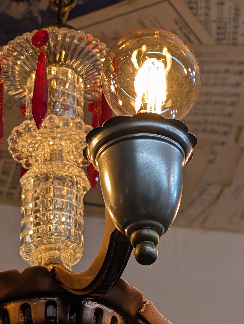 Cast iron, and sandwich Glass chandelier
