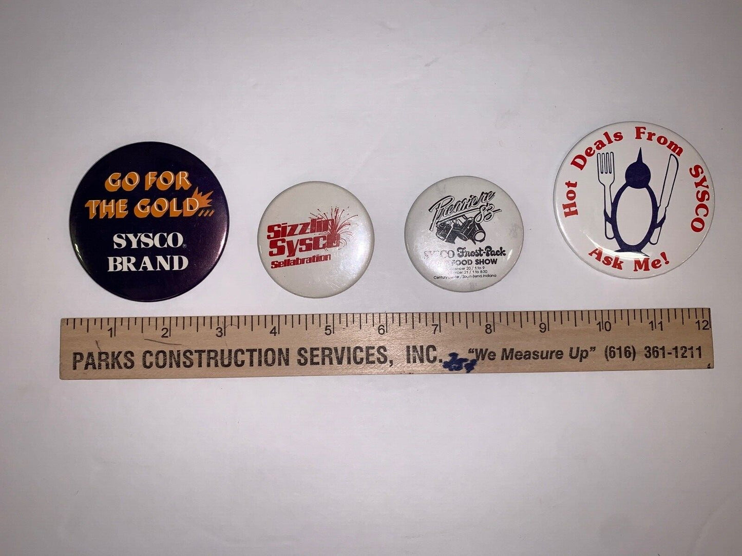 Lot of 8 Vintage Sysco Advertising Pinback