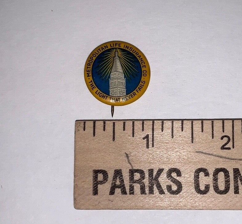 Metropolitan Life Insurance Co - The Light That Never Fails 7/8" Pinback