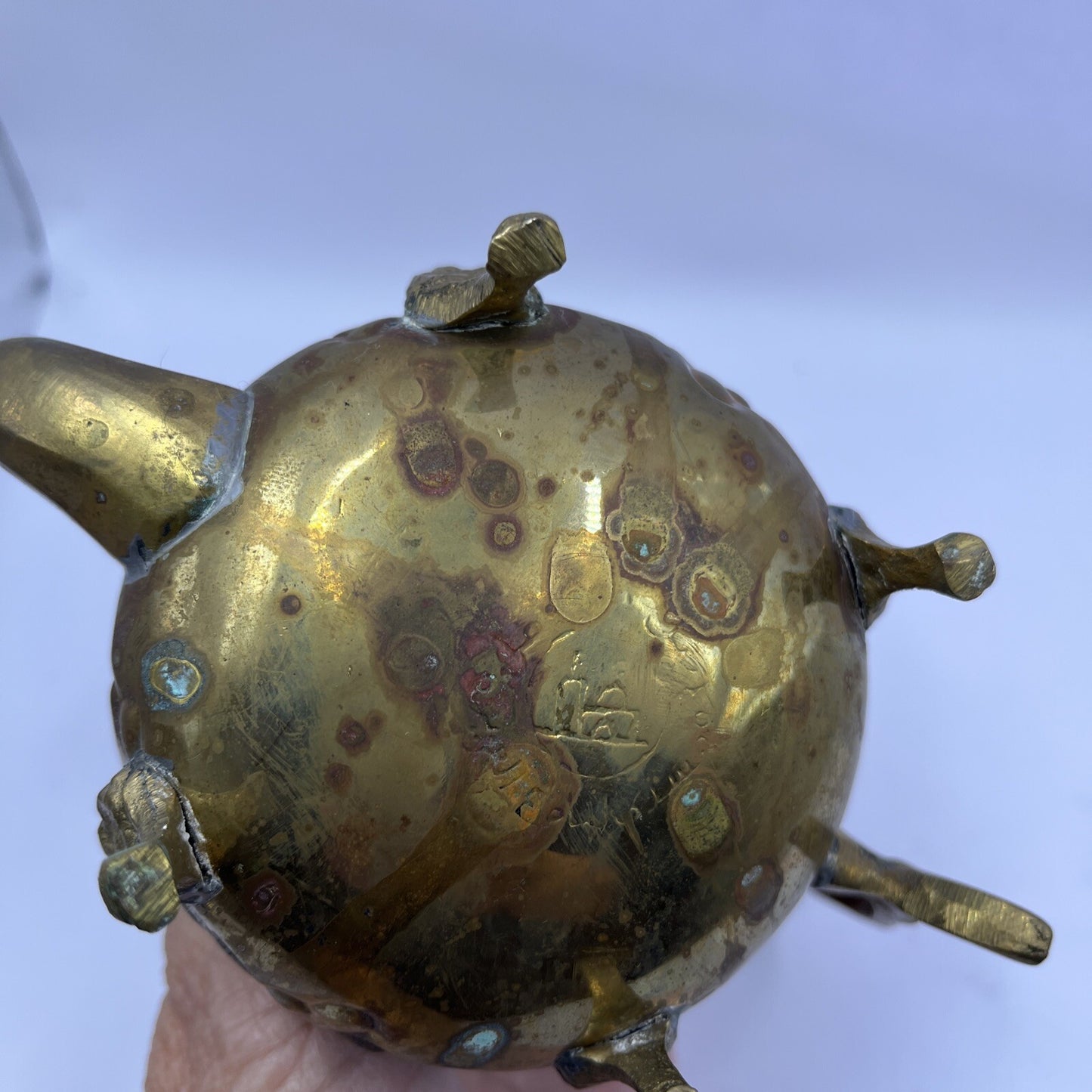 Vintage Middle East floral footed metal teapot