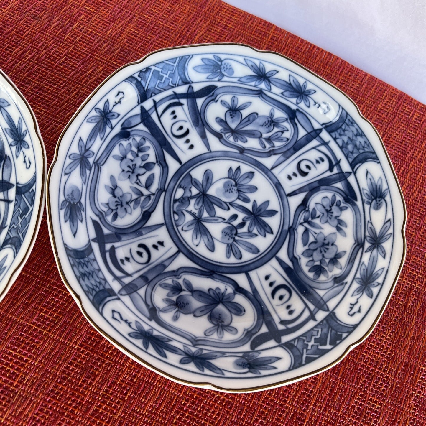 6 3/8” Rd. Blue and White Porcelain Takahash(2) San Francisco Bowl Fruit Floral