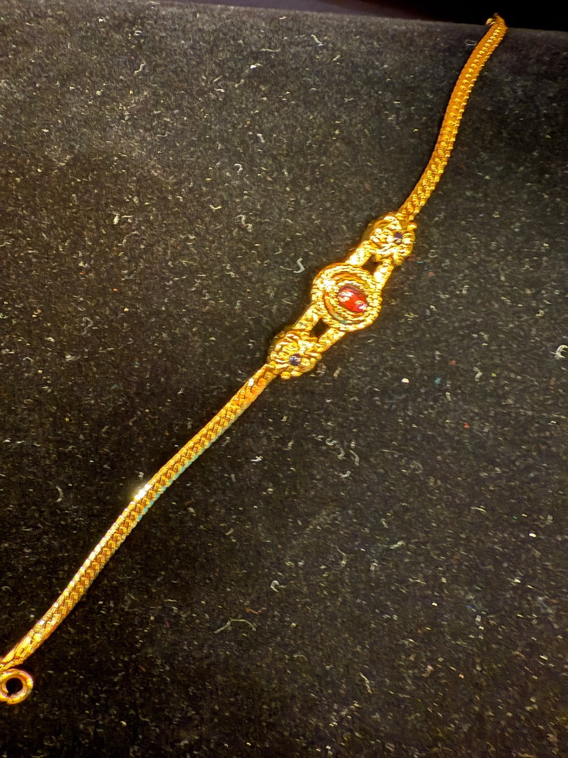 Avon Goldtone 7 Purple Cabochon Bracelet