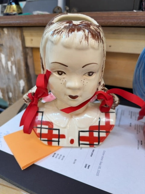 Stanford pottery girl wall pocket