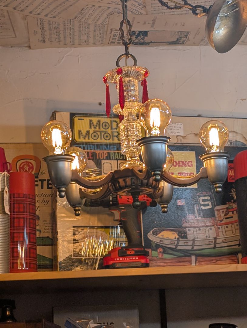 Cast iron, and sandwich Glass chandelier