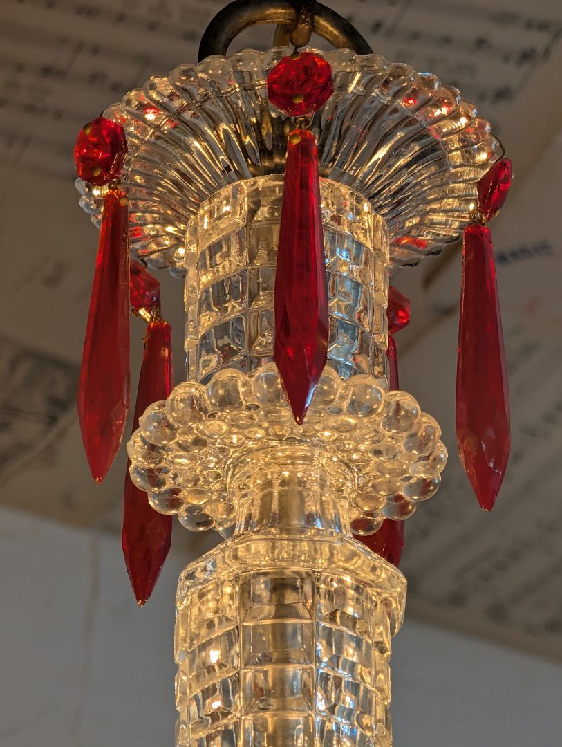 Cast iron, and sandwich Glass chandelier