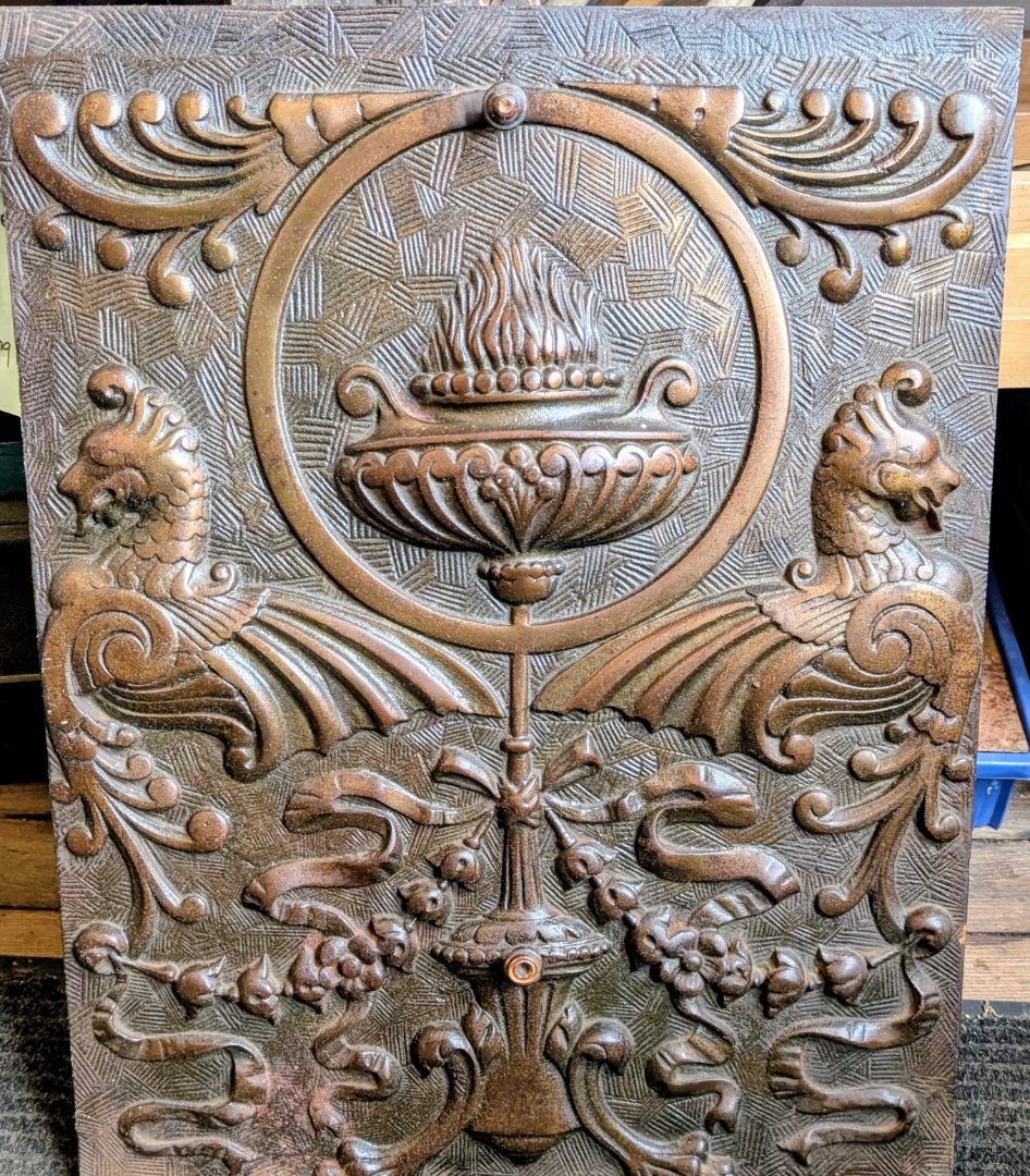 20" X 26" cast iron fireplace cover with Sphinx