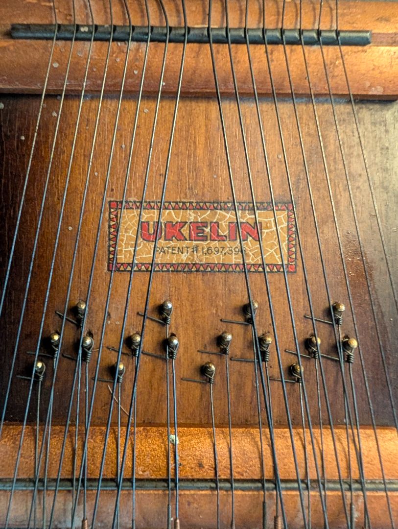 Ukeline lap harp.