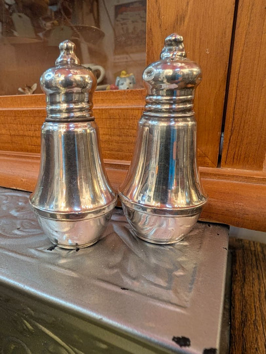 Weighted sterling silver salt and pepper shakers