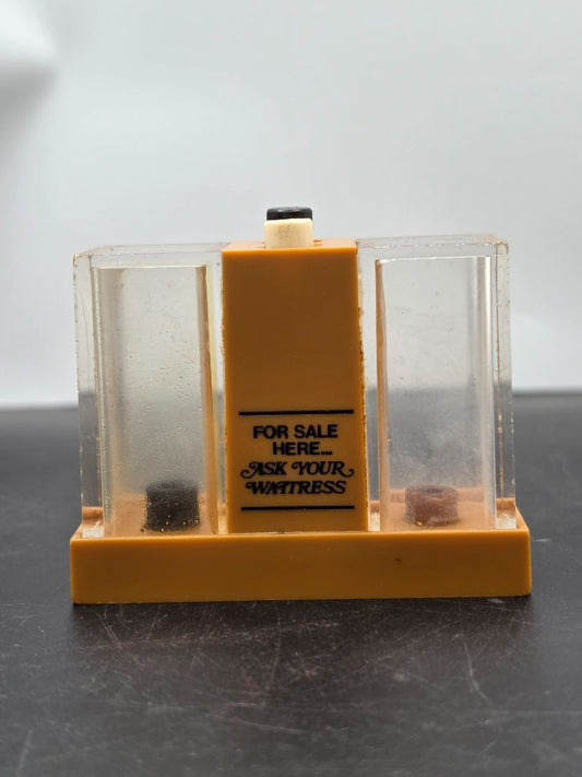 Vintage Whirley Industries plastic push-button salt and pepper shaker set