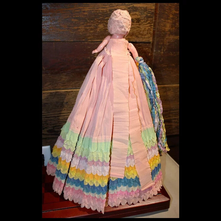 1930's Celluloid Carnival Doll with colorful crepe paper dress