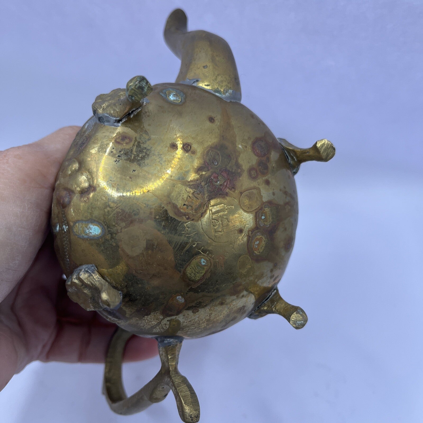 Vintage Middle East floral footed metal teapot
