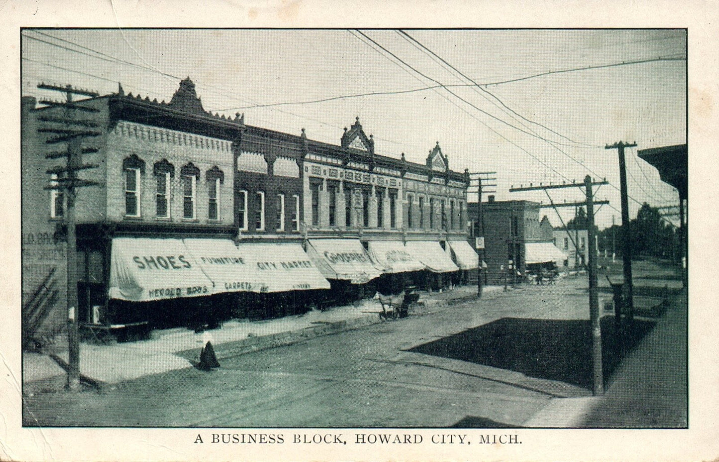 A Business Block in Howard City MI Michigan Mich Postcard