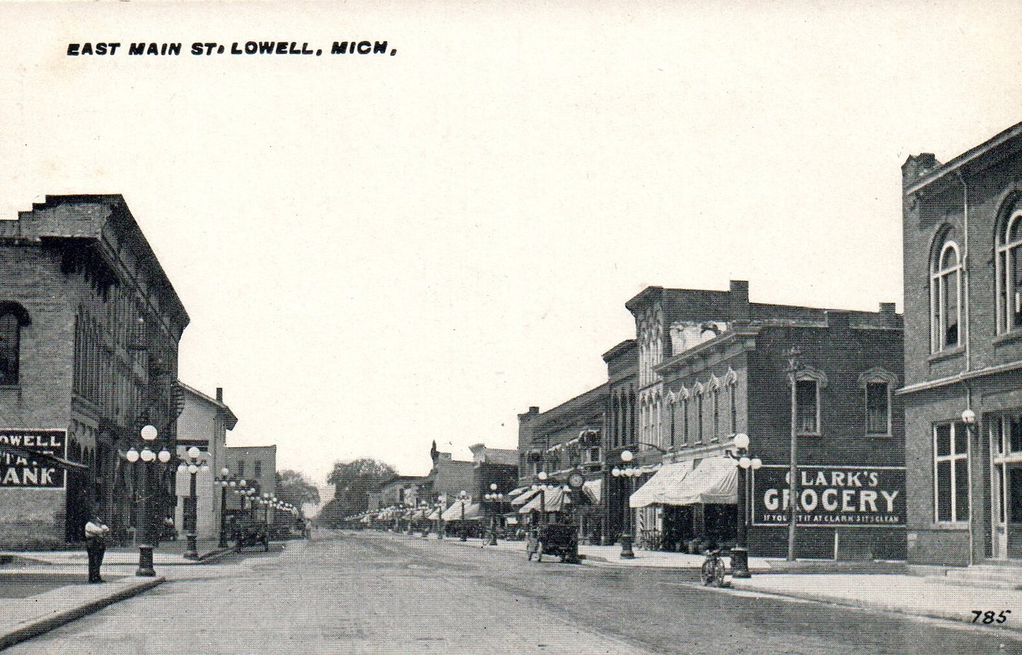 View of East Main Street in Lowell MI Michigan Mich Postcard