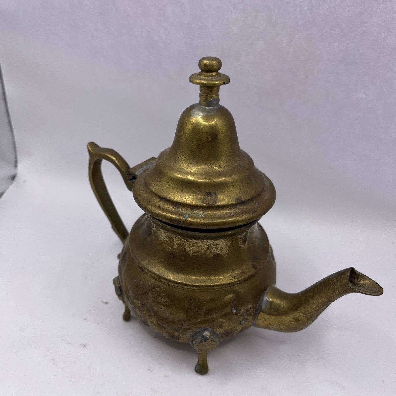 Vintage Middle East floral footed metal teapot