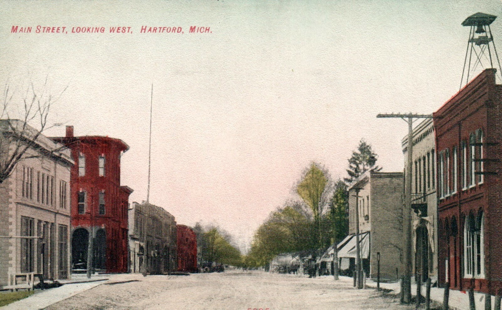 Main street Looking West Hartford MI Michigan Mich  Postcard