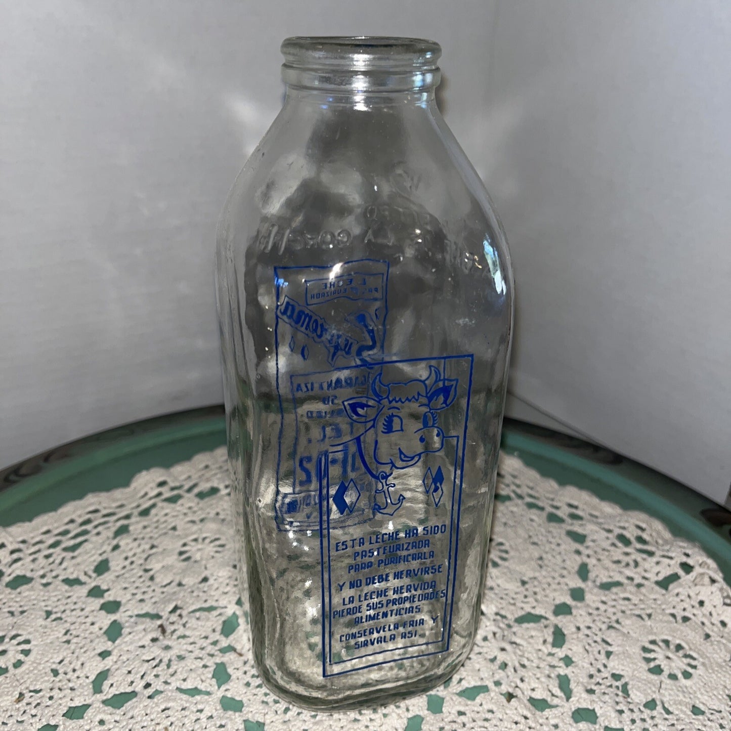 Suprema Milk Bottle - Spanish - 8 1/2" tall