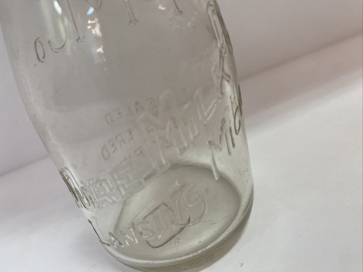 Pure Milk Dairy Co Lansing MI Michigan 1/2 pt half pint milk bottle clear PM Co
