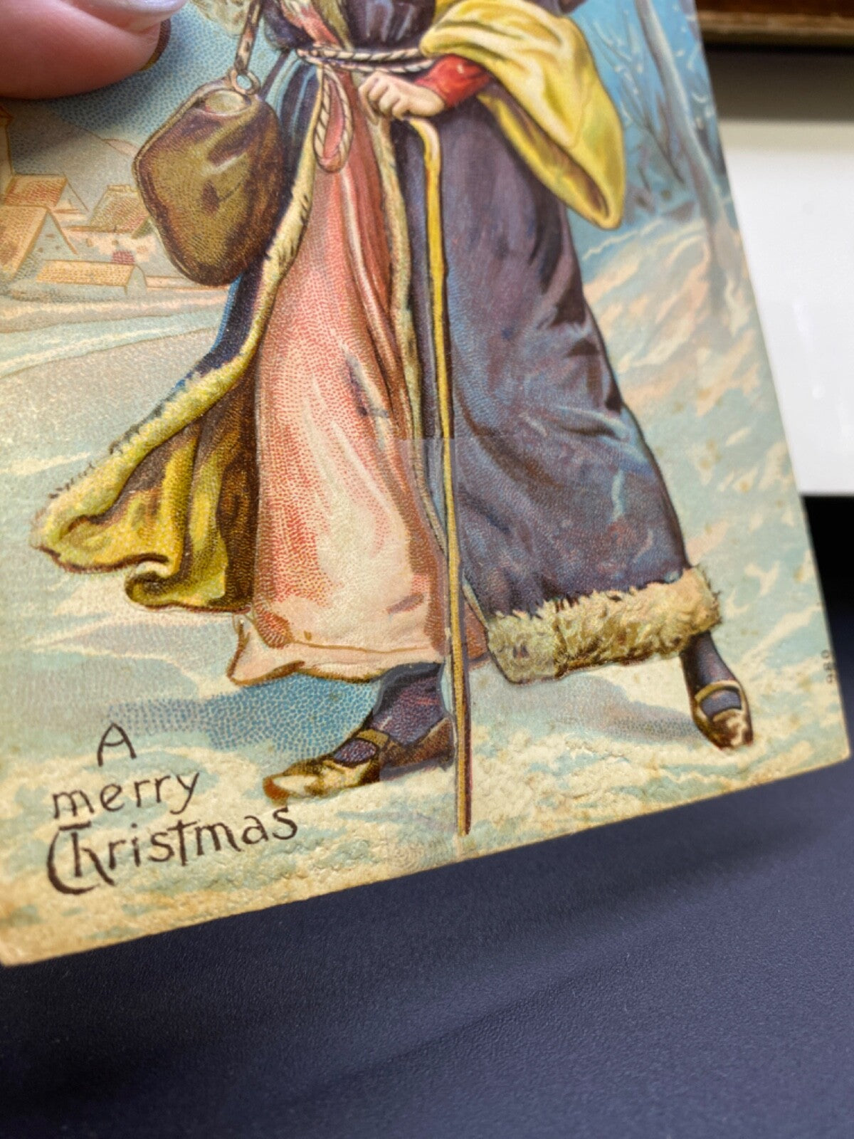 A Merry Christmas Purple Santa w/ Toys on Back & Tree Santa Postcard DAMAGED