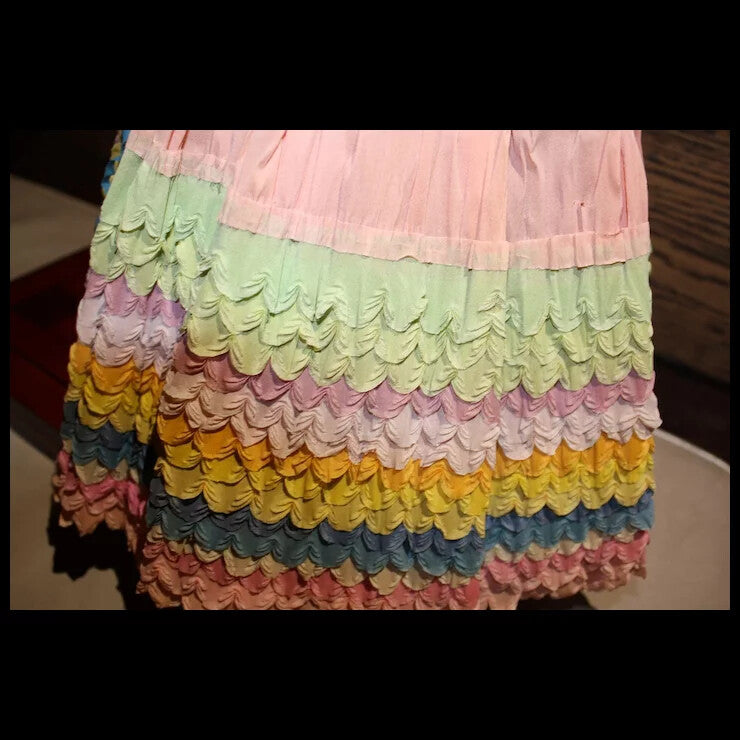 1930's Celluloid Carnival Doll with colorful crepe paper dress