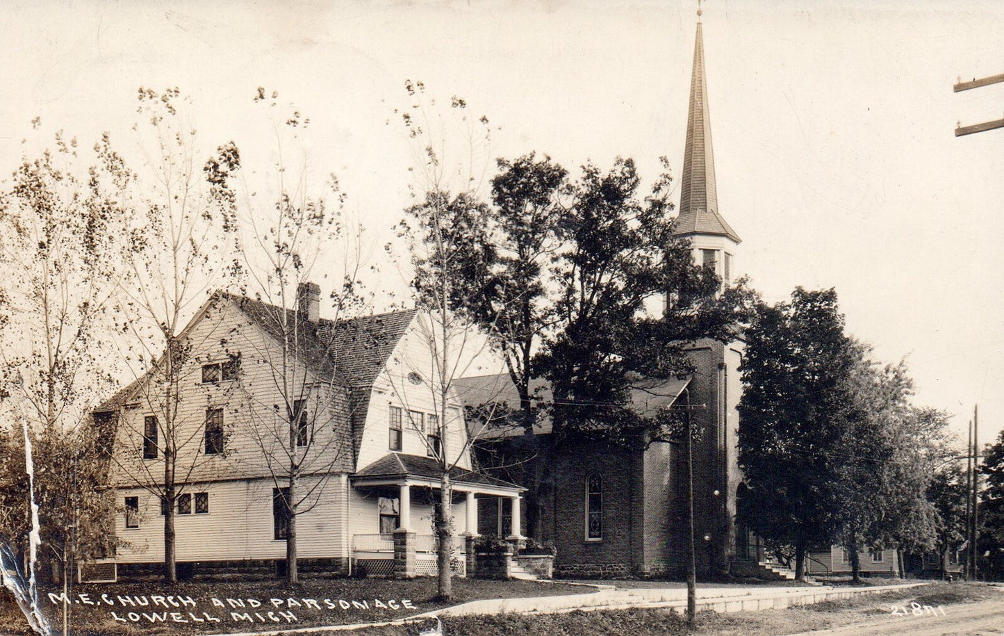 RPPC M.E. Church & Parsonage in Lowell Michigan Mich MI Postcard