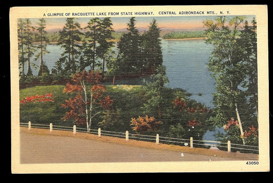 A Glimpse of Racquette Lake from State Highway Central Adirondack Mt New York NY