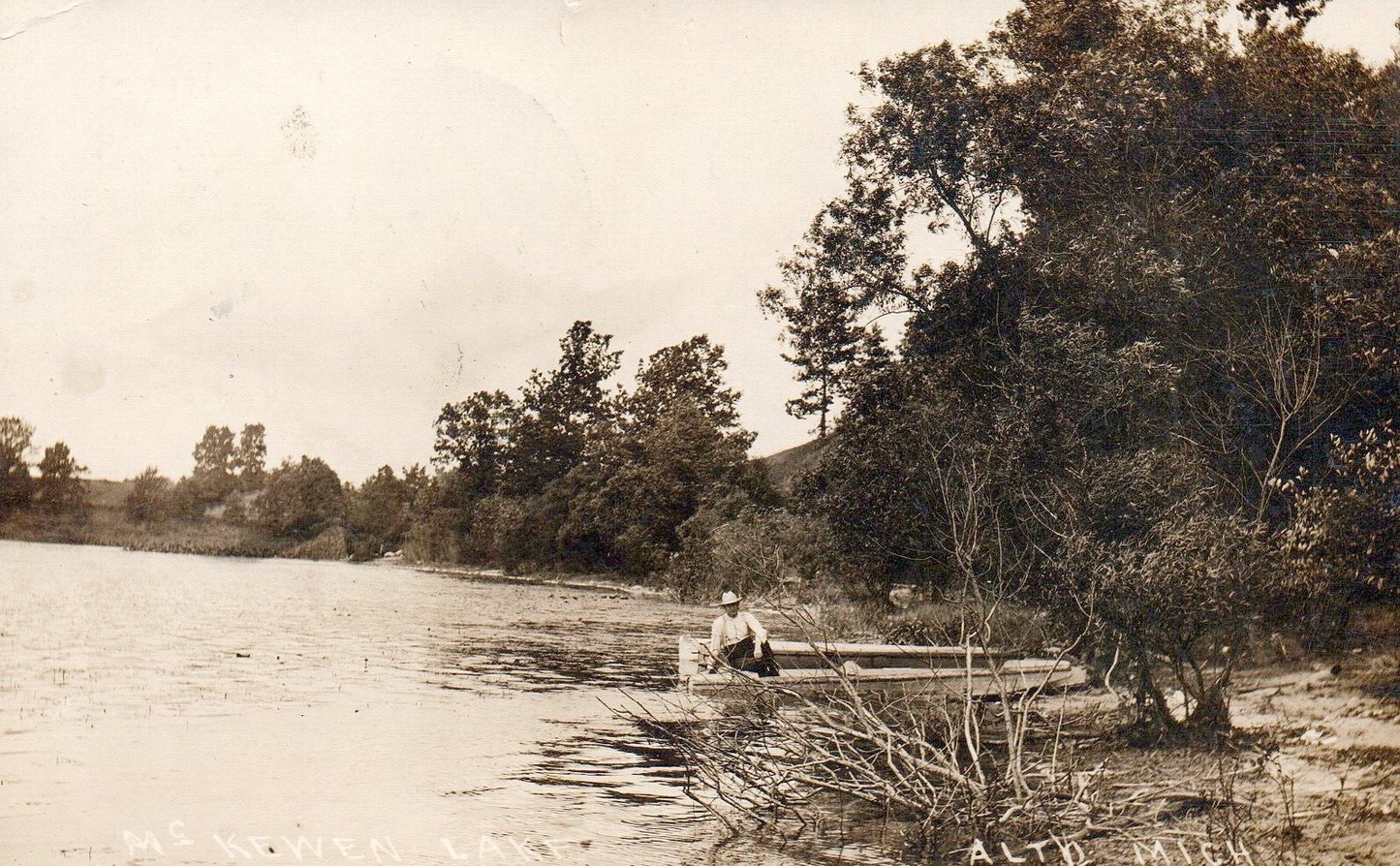 Real Photo of McKewen Lake Man on Boat in Alto Michigan Postcard