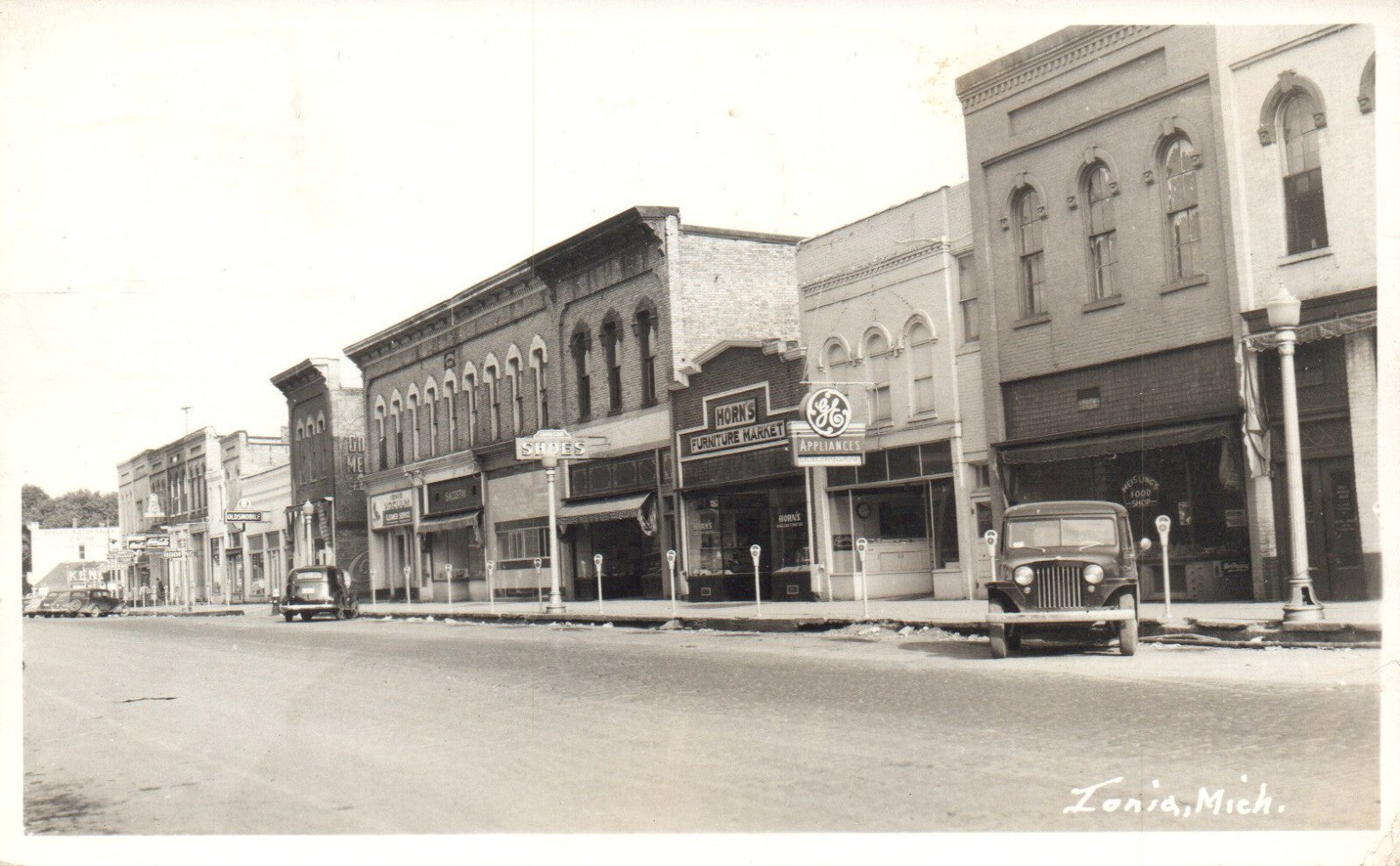 Ionia Main Street 1949 MI Mich Michigan Postcard Real Photo OLD CAR