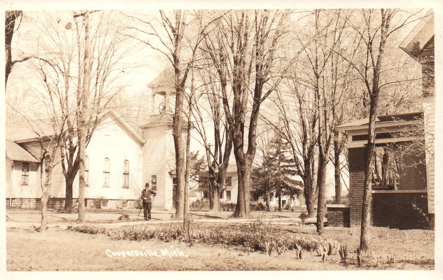 Real Photo of Man In Front of Church in Coopersville MI Michigan Postcard