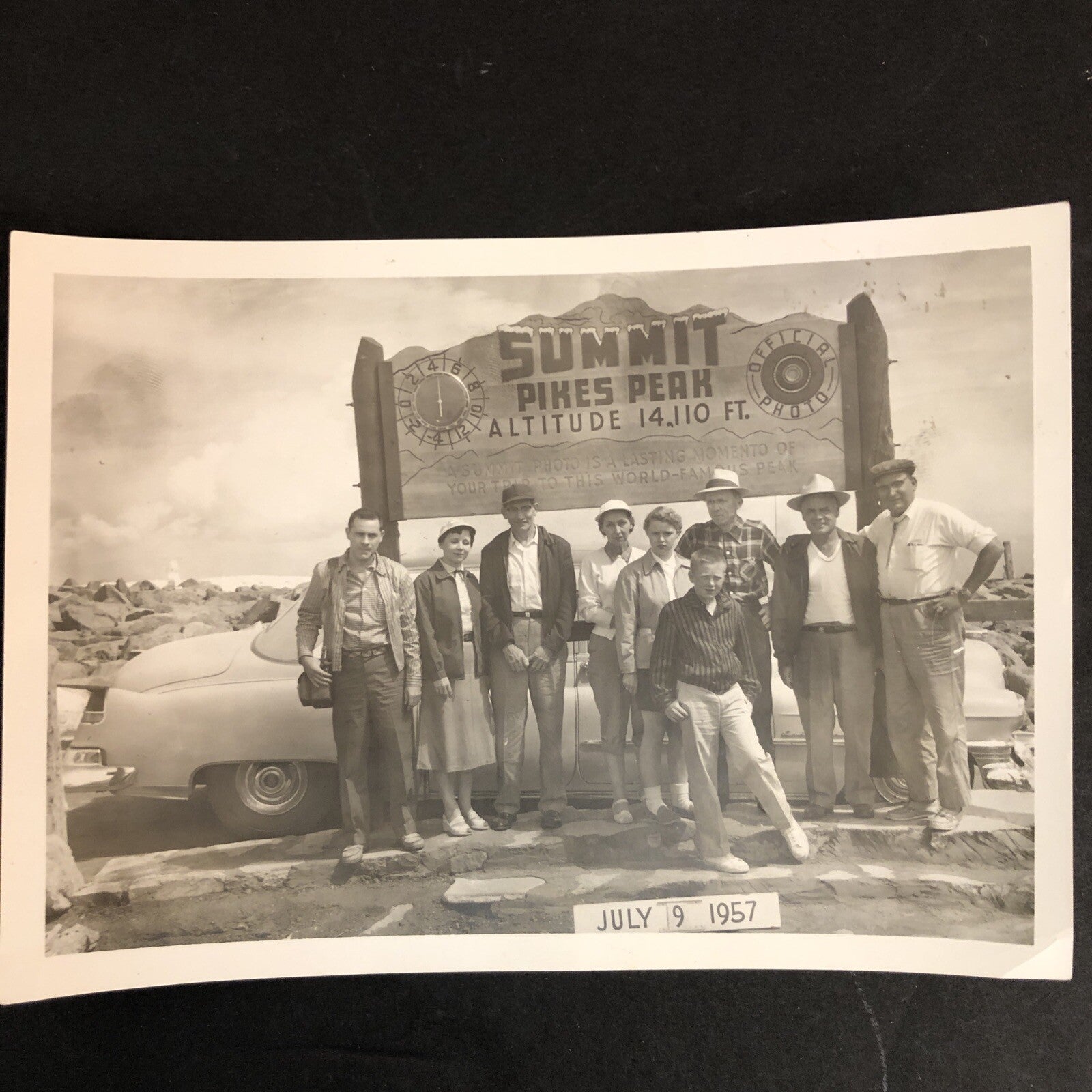 Real Photo Summit Pikes Peak 9 People Stand by Cadillac car dated July 9 1957