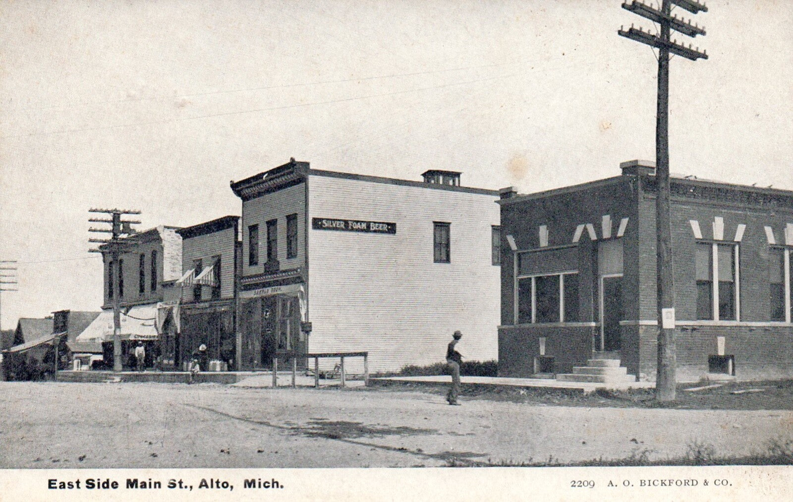East Side of Main Street in Alto Michigan Vintage Postcard