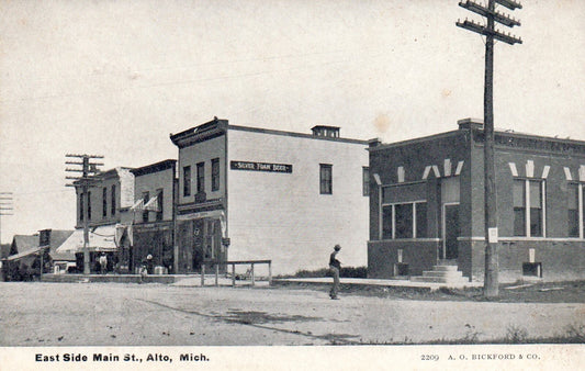East Side of Main Street in Alto Michigan Vintage Postcard