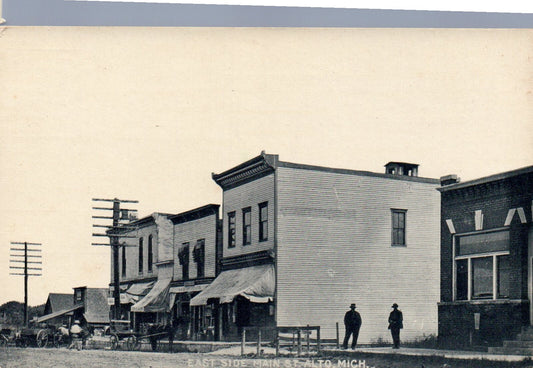 East Side of Main Street in Alto Michigan Vintage Postcard