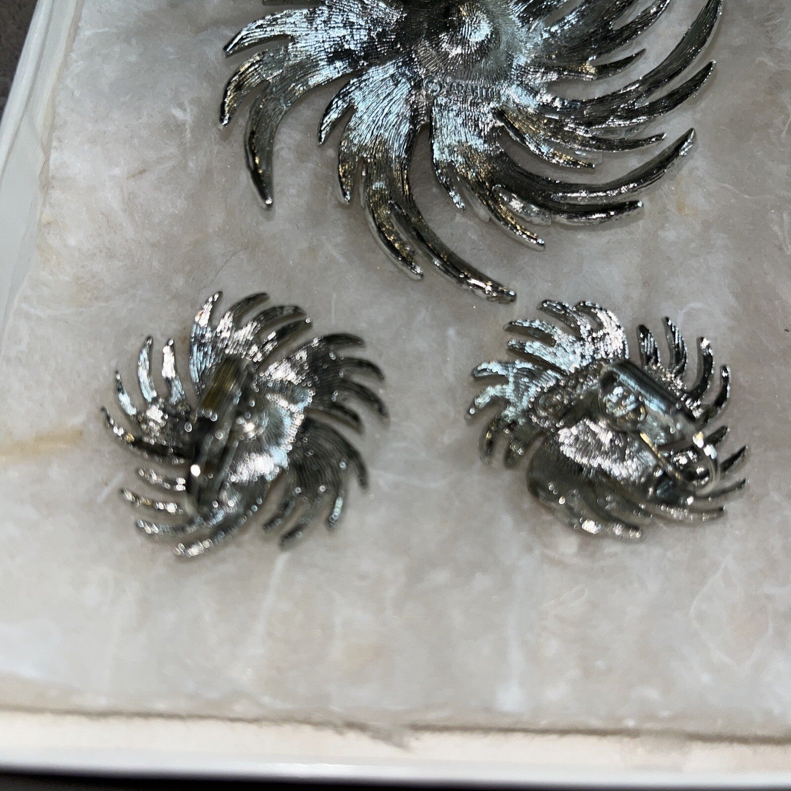 Vintage Sarah Coventry Silver Tone Pinwheel Brooch with Faux Pearl Middle