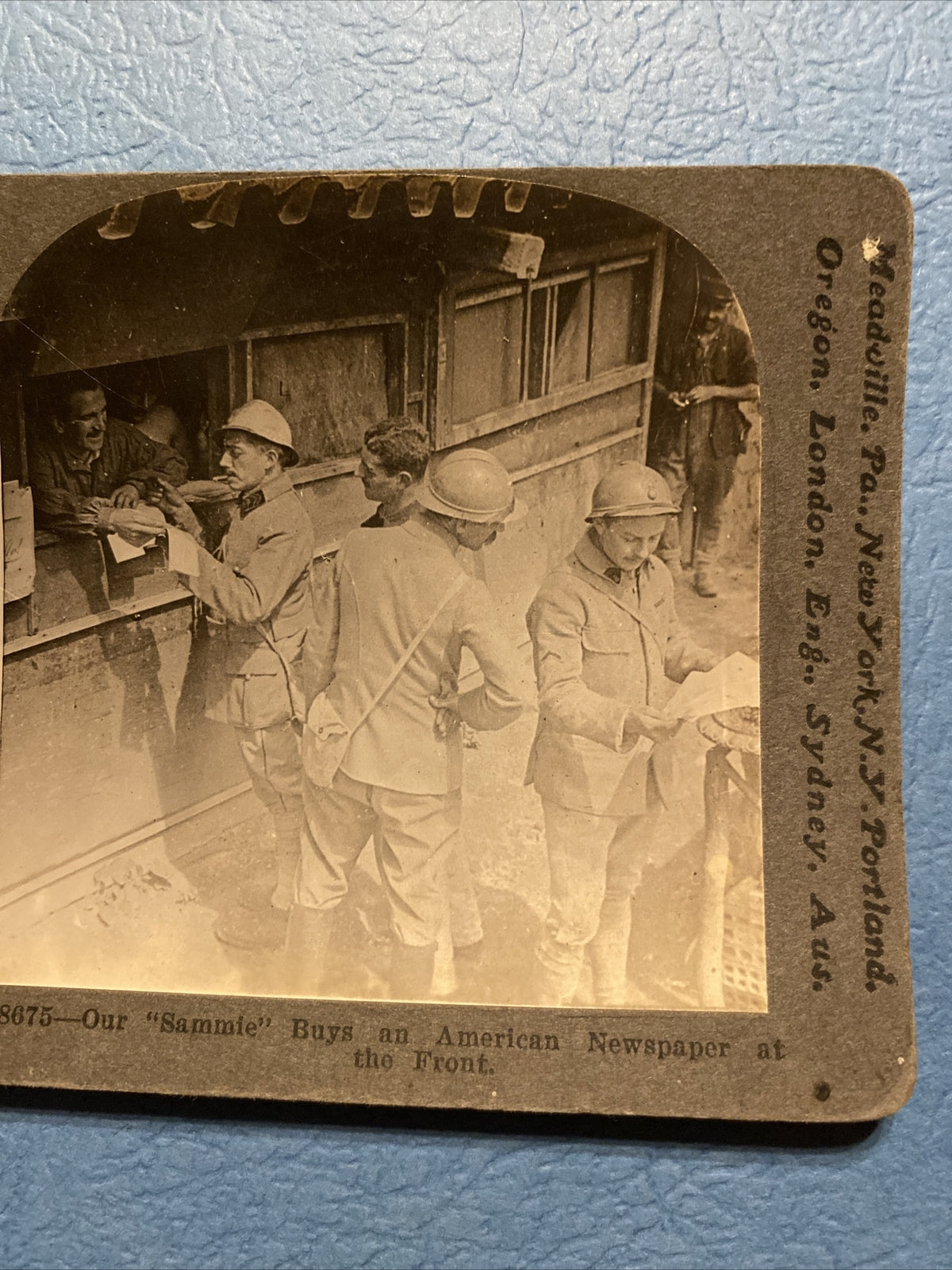 Real Photo Stereoview soldier buys an American Newspaper at the Front 