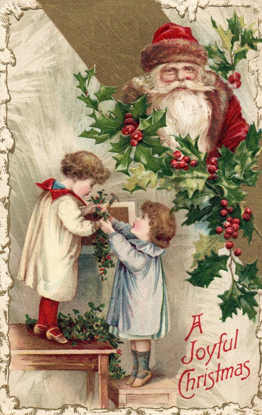 A Joyful Christmas Children Hanging Up Holly With Santa Vintage Santa Postcard