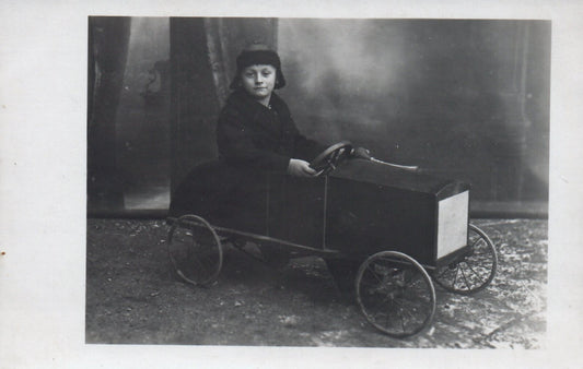 Real Photo Little Boy Playing in his Old Toy Pedal Car Postcard