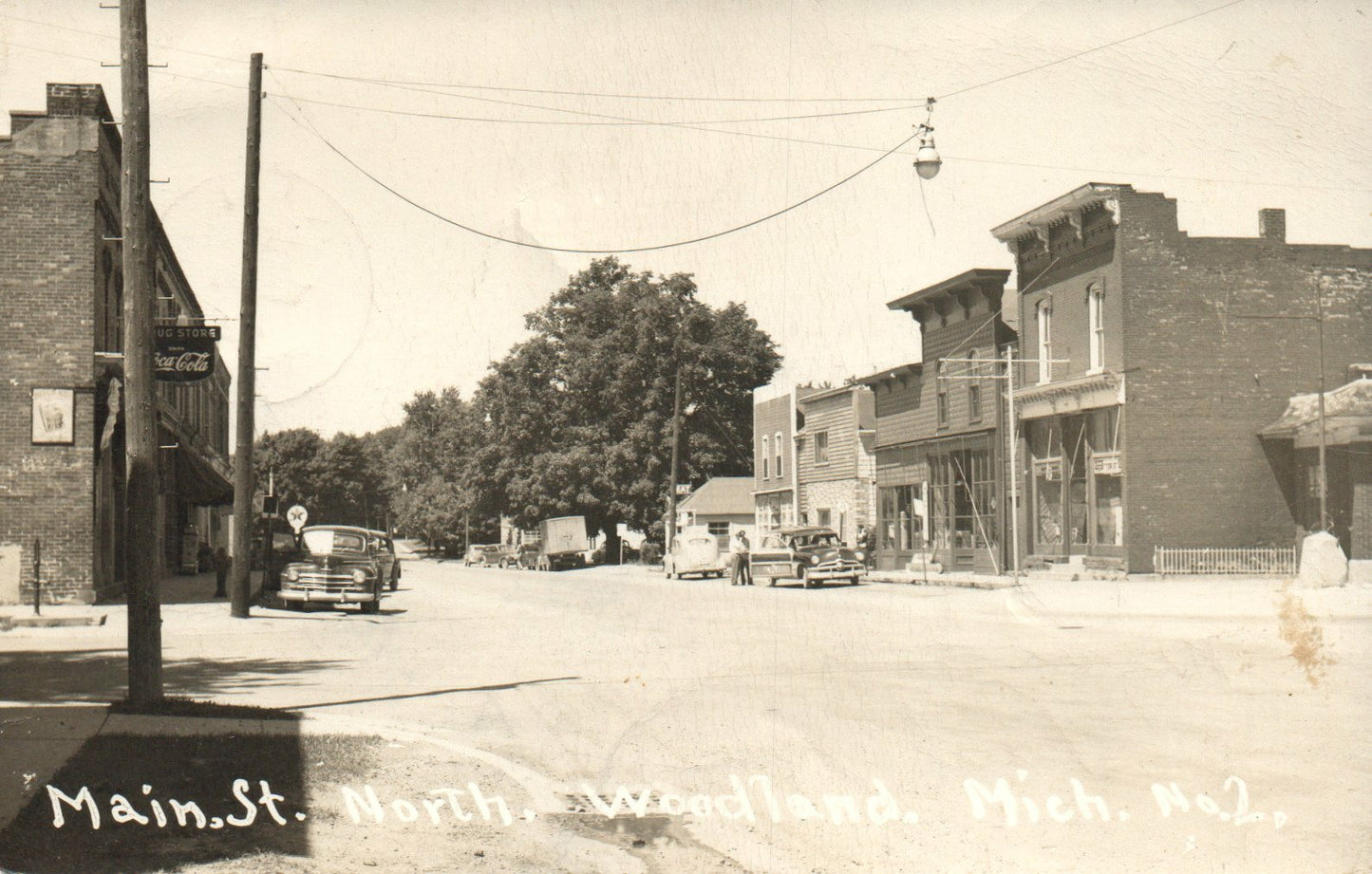 Real Photo Old Car Downtown Main Street North Woodland MI Michigan Postcard 
