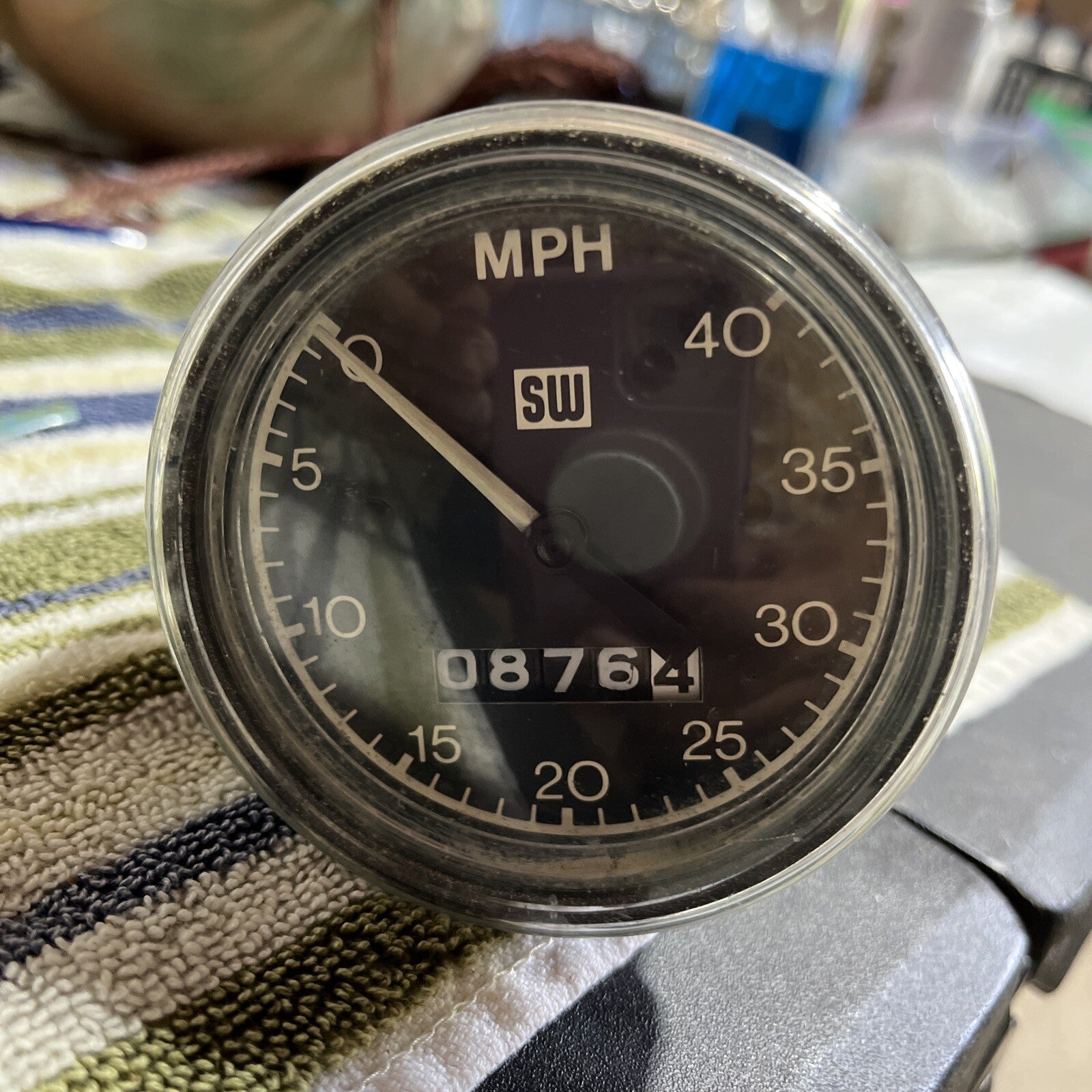 NEW NOS STEWART WARNER COUNTER CLOCKWISE SPEEDOMETER ODOMETER GAUGE MPH MOPED SW