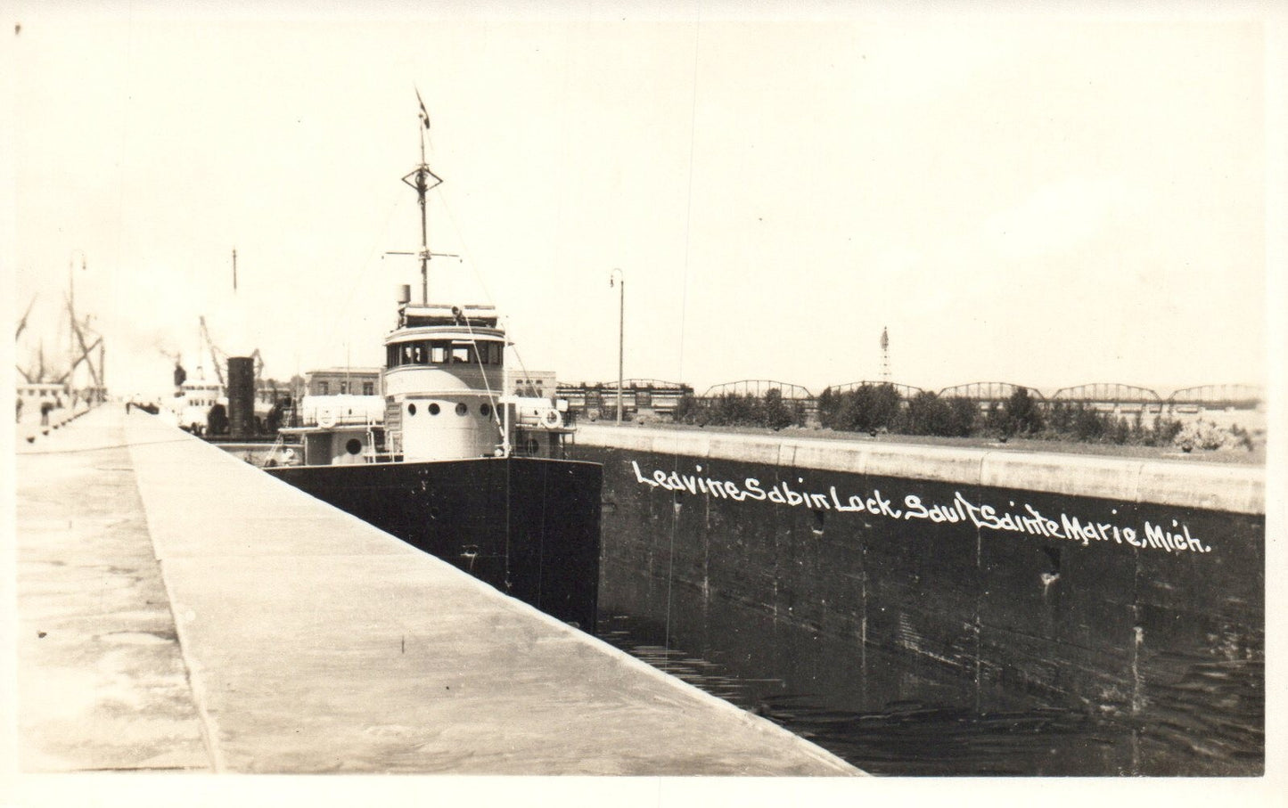 RPPC Large Boat Leaving Sabin Lock Sault Ste. Marie MI Michigan Mich Postcard