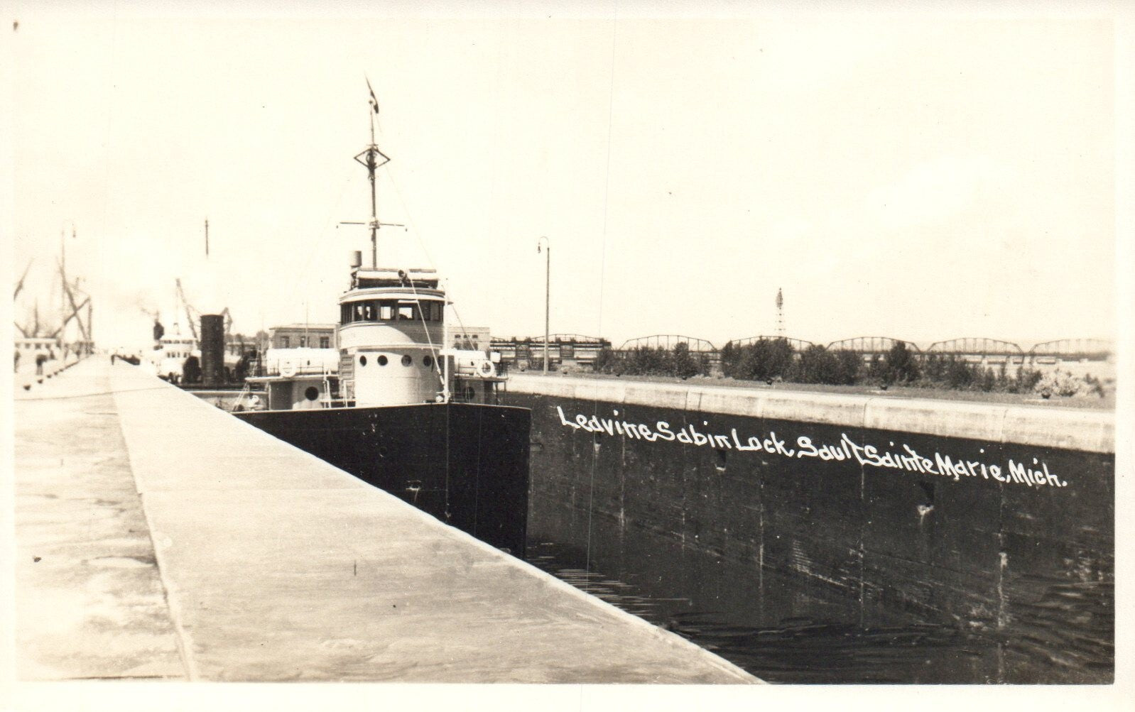 RPPC Large Boat Leaving Sabin Lock Sault Ste. Marie MI Michigan Mich Postcard