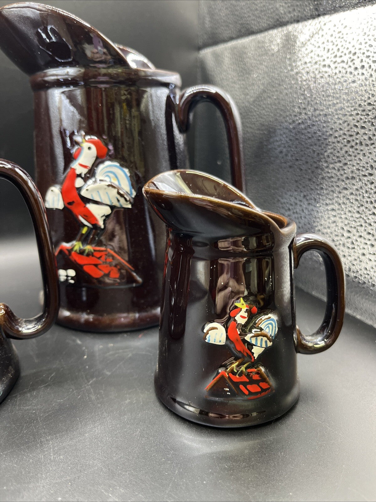 Unbranded Pair Iridescent Brown Hand Painted Embossed Rooster Pottery Pitchers