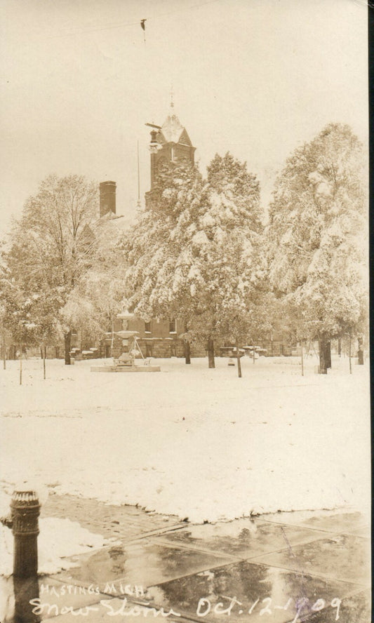 1909 Real Photo Snowstorm Fountain Court House Hastings MI Michigan Postcard