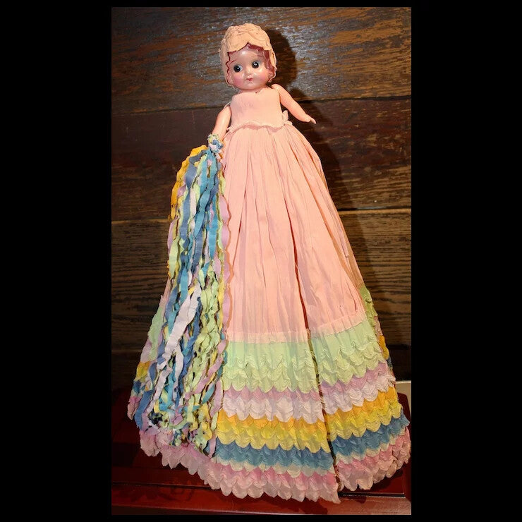 1930's Celluloid Carnival Doll with colorful crepe paper dress