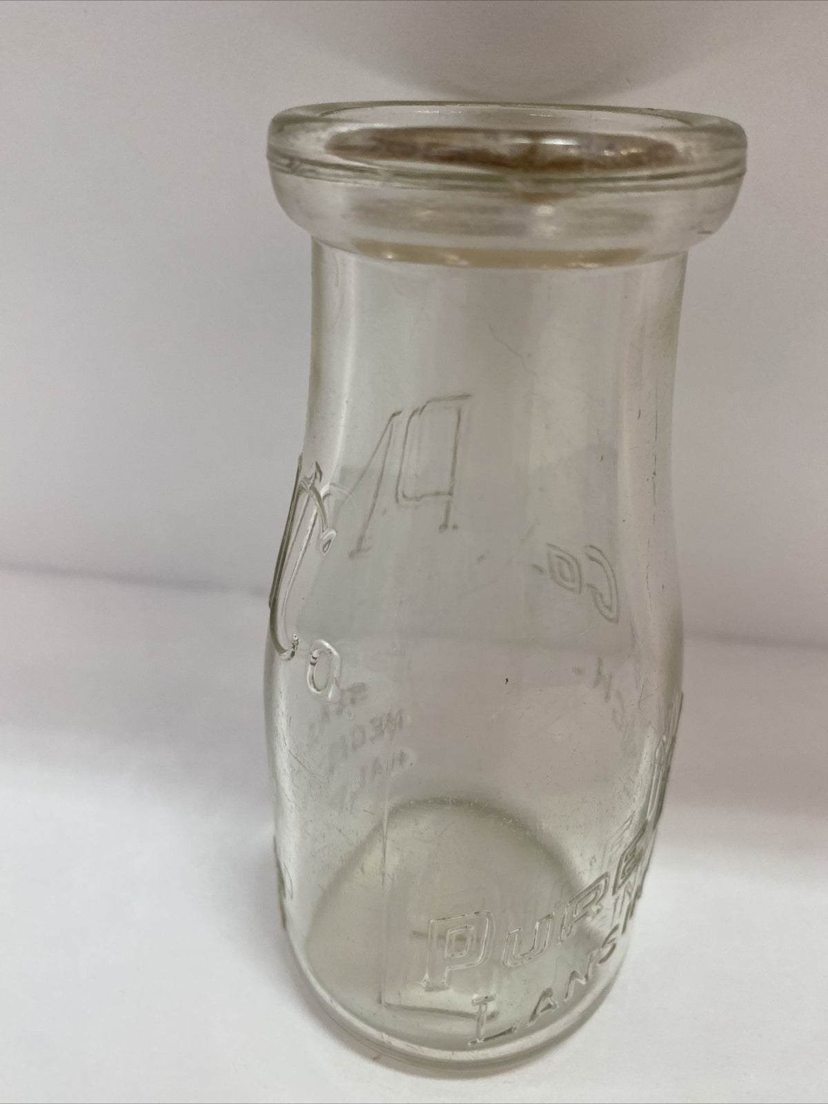 Pure Milk Dairy Co Lansing MI Michigan 1/2 pt half pint milk bottle clear PM Co