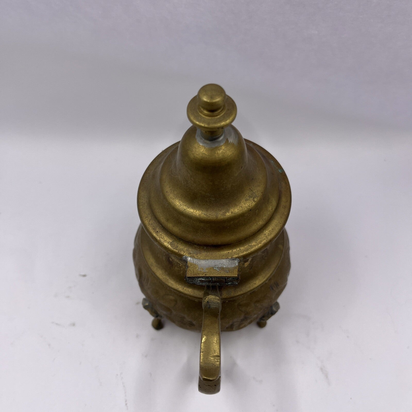 Vintage Middle East floral footed metal teapot