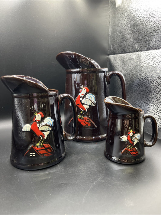 Unbranded Pair Iridescent Brown Hand Painted Embossed Rooster Pottery Pitchers