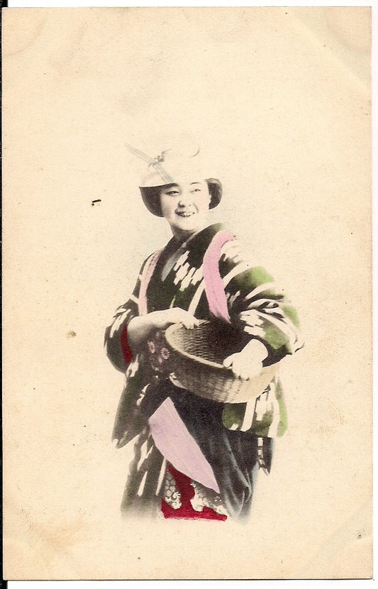 Japanese woman holding basket Japan Postcard