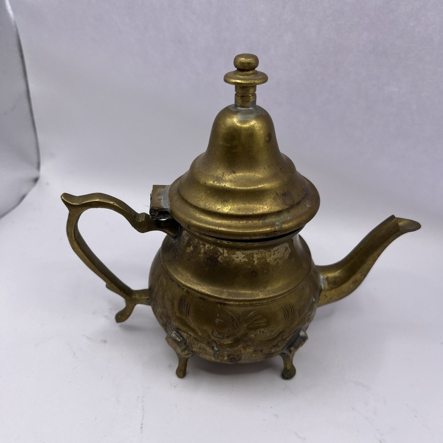 Vintage Middle East floral footed metal teapot