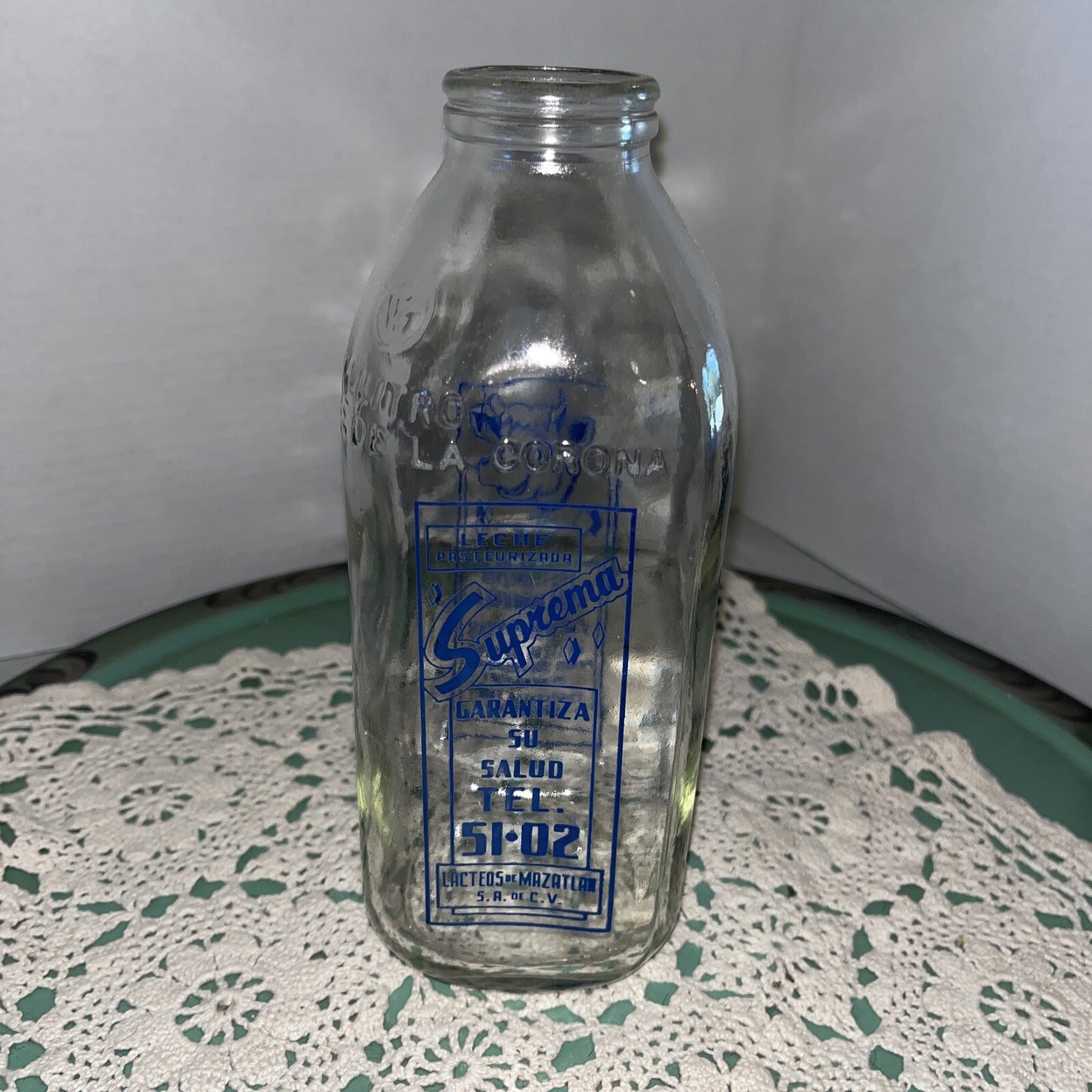Suprema Milk Bottle - Spanish - 8 1/2" tall