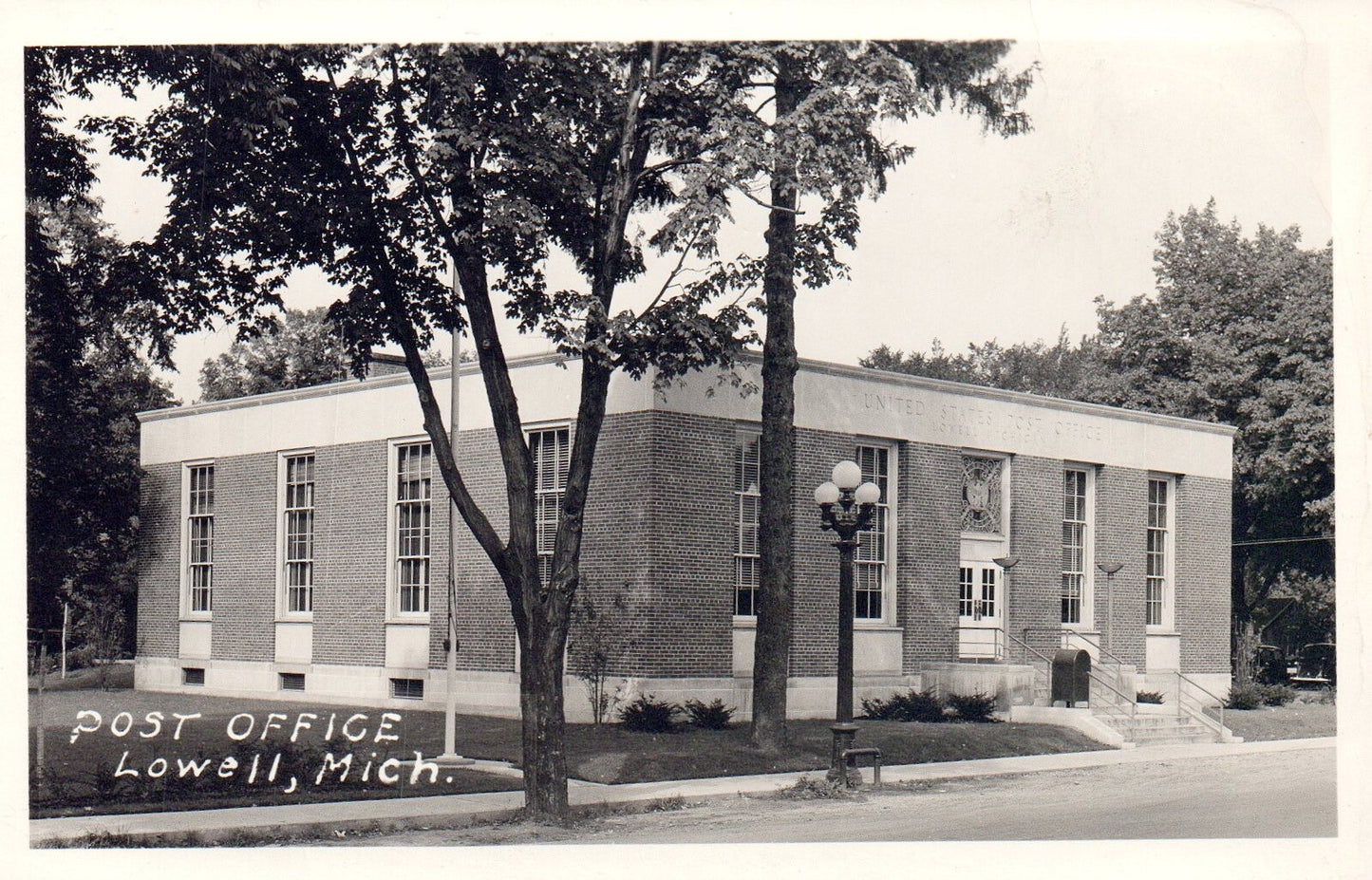 Real Photo Post Office Old lamp posts Lowell MI Michigan Mich  Postcard